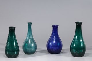 Group of Four Hand Blown Glass Bottles
