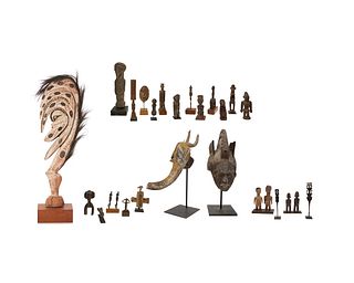 A large group of African and Oceanic figures