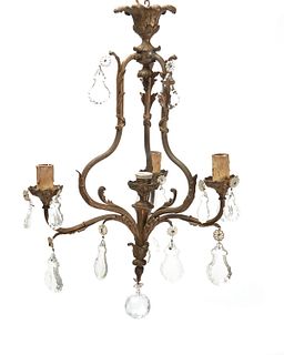 A bronze and cut crystal chandelier