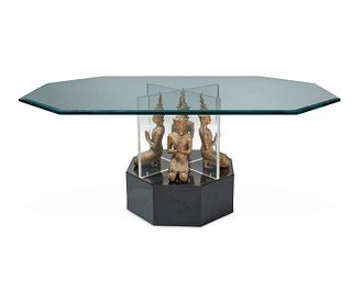 A Tibetan-style sculptural Lucite and metal coffee table