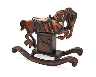A large Carousel-style carved wood rocking horse
