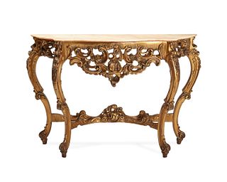 An Italian carved giltwood demi-lune