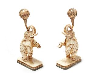 A pair of Chinese bone veneer elephant figures