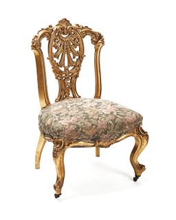 A French Louis XV-style carved giltwood chair