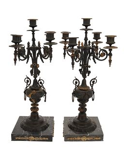 A pair of Louis XVI-style candelabra