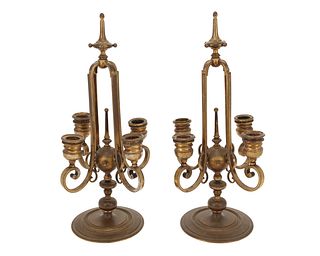 A pair of Ferdinand Barbedienne bronze candelabra