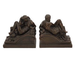 A pair of Armor Bronze "Night and Day" figural bookends