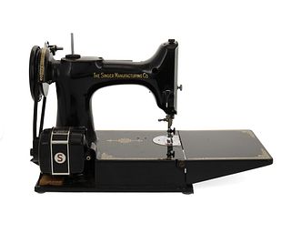 A Singer Featherweight portable sewing machine, 221K