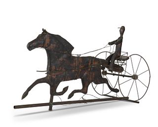 A copper horse and sulky weathervane