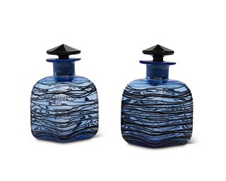 A pair of Steuben glass dresser bottles
