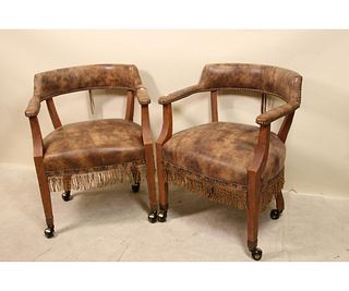 SET OF FOUR CLUB CHAIRS ON CASTERS