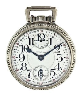 A Waltham Vanguard pocket watch with wind indicator