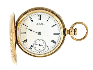 An 18 karat gold key wind and set 8 size Waltham pocket watch