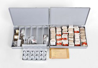 A large lot of parts and material for watchmakers