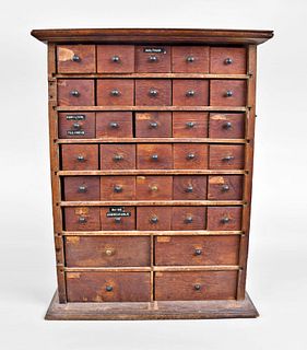Two 34 drawer oak watchmakers parts cabinets