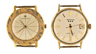 A lot of two men's gold wrist watches