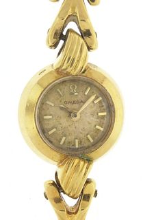 A lady's Omega gold wrist watch