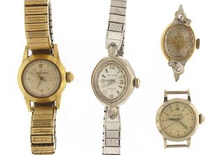 A lot of nine lady's wrist watches most in 14 karat gold