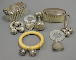Lot of sterling silver including baby rattles, two are Tiffany rattles, and two baby brushes.