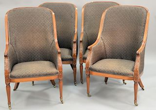 Set of four Sheraton style upholstered tub type chairs.