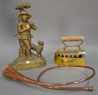 Two brass door stops including man and dog and a copper horn. ht. 15 1/2 in.