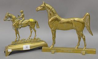 Two brass horse door stops one marked Copyright 1938 Rife & Loth. Waynesburg VA. ht. 9 in.; lg. 9 1/2 in. and ht. 11 1/2 in.; lg. 11...