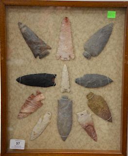 American Indian spear heads, 11 pieces in case.