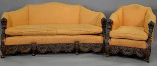 Two piece carved walnut parlor set. sofa: lg. 71 in.