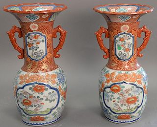 Pair of large Imari porcelain baluster vases with handles, signed on bottom. ht. 22 in.