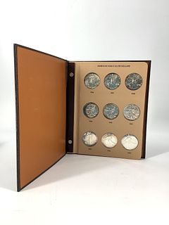 U.S. Silver Eagle Dollar Coins In Album