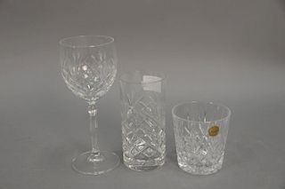 Eighteen piece lot of crystal in original boxes including stems, tall glasses, rocks glasses, Badash & Crystal d'Arques.