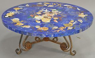 Circular Lapis Lazuli and specimens marine motif marble inlaid coffee table with iron base having malachite, lapis lazuli, and sever...