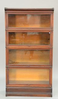 Mahogany four section stacking bookcase. ht. 64 in.; wd. 34 in.; dp. 11 in.