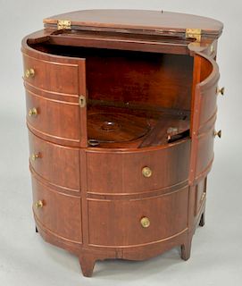 George III mahogany commode in demilune cabinet with opening top and doors. ht. 30 in.; wd. 25 in.