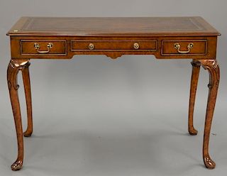 Burlwood writing table with tooled leather top. ht. 30 in.; top: 44" x 22"