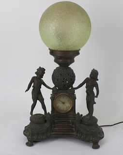 Art Deco Gilt Metal Figural Clock Lamp.