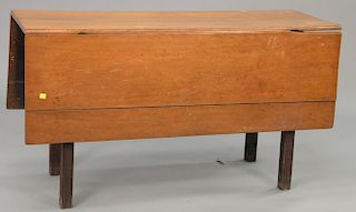 Chippendale drop leaf table with carved ends, circa 1780. ht. 27 in.; top: 48" x 16"