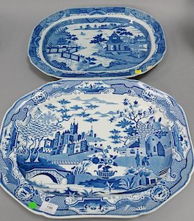 Two large blue and white platters (one with rim chips). 16" x 20 1/2" and 14" x 19"