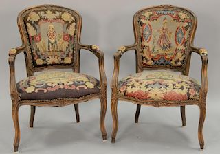 Pair of French style armchairs with needlepoint seats and backs.