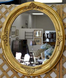 Two gilt framed mirrors including large oval Victorian and a rectangular mirror. 36" x 28" & 40" x 36"