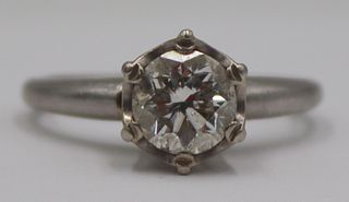 JEWELRY. Platinum and Diamond Engagement Ring.