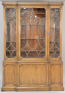 Mahogany breakfront with glazed bowed glass in two parts (one glass missing). ht. 88 in.; wd. 60 1/2 in.; dp. 11 in.