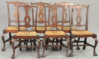 Seven piece mahogany dining room set including six Chippendale style chairs and drop leaf table. ht. 29 in.