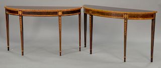 Pair of Council demilune mahogany tables with banded and bell flower inlays. ht. 32 in.; wd. 54 in.; dp. 15 1/2 in.