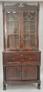 Empire mahogany butler's secretary desk in two parts, butlers desk opens to reveal birdseye maple drawer fronts, all on paw feet, ci...