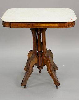 Victorian marble top table on hoof feet. ht. 30 in.; top: 22" x 30"