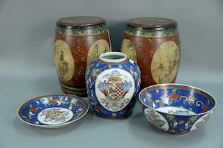 Two barrel form wood seats along with three Asian porcelain pieces. barrel: ht. 18 in.