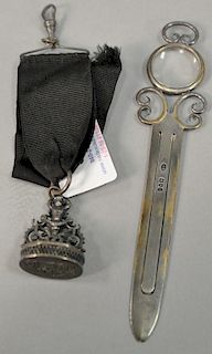 Two piece silver lot including Gorham figural stamp and letter opener, and a magnifier.