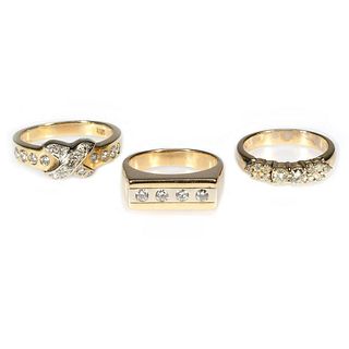 Three diamond and 14k gold rings