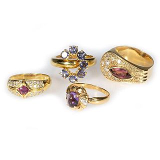 Four gem-set and 18k gold rings